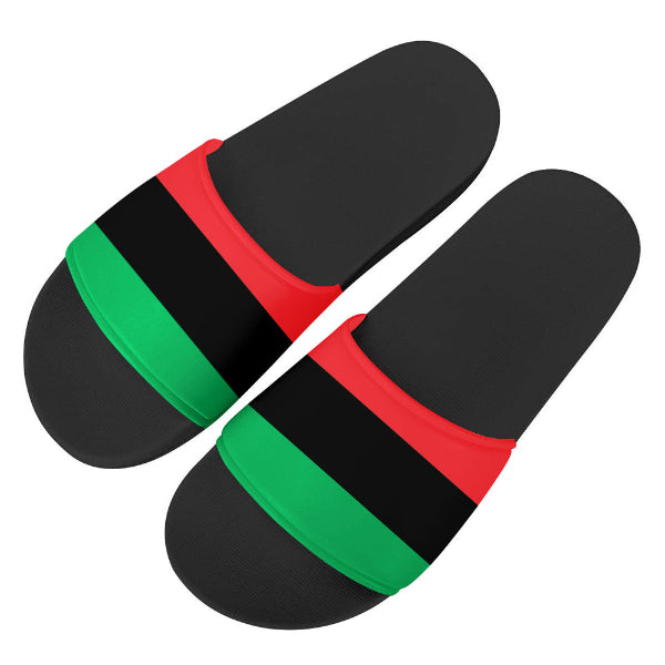 Black slippers with red and green stripes on a white background