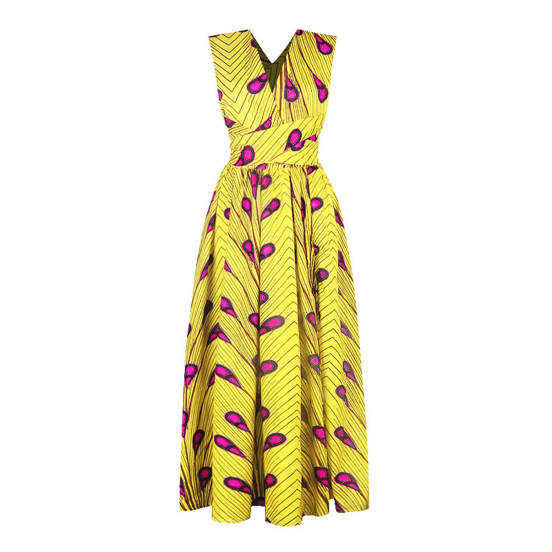 Yellow dress with pink pattern on a white background