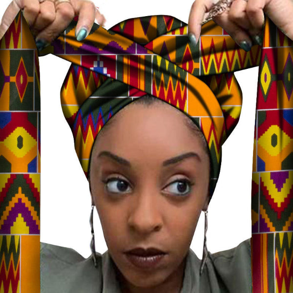 Woman wearing a colorful patterned headscarf with a white background