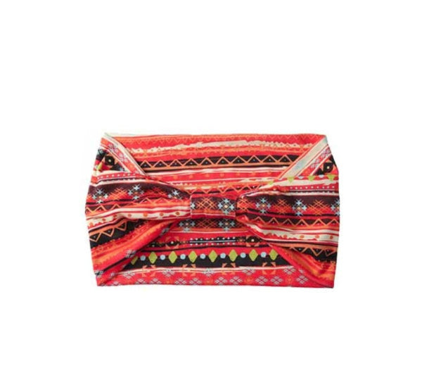 Red patterned headband on a white background
