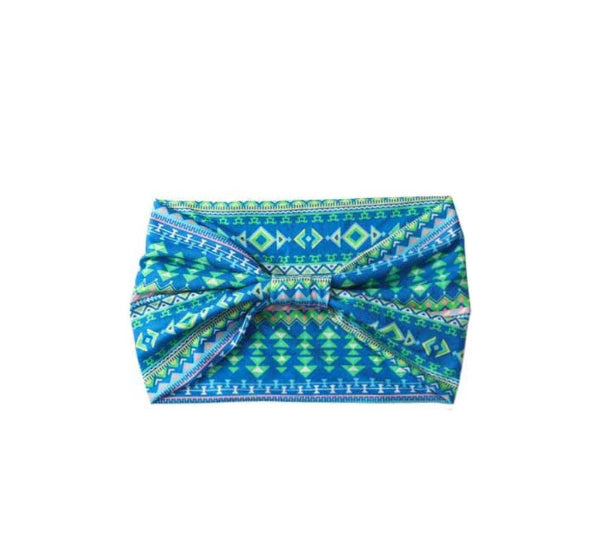 Blue and green patterned headband on a white background