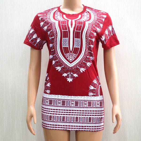 Red and white patterned dress on a mannequin against a white background